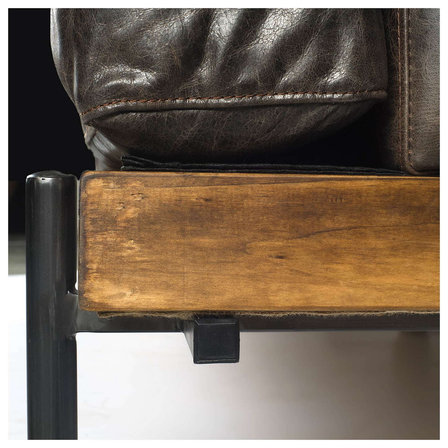 The Capone Leather Wide Accent Chair With Wood And Black Iron Base